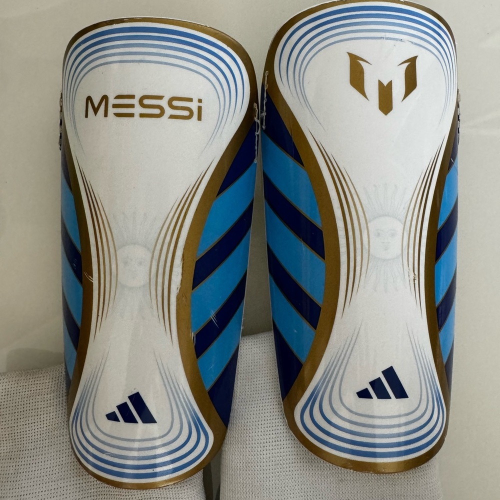 adidas Jr. Messi Match Shin Guards.